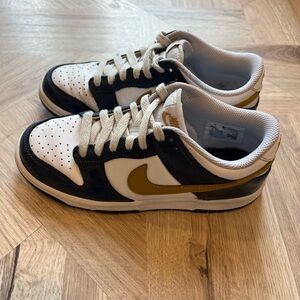 Nike Kids Navy Blue and White Sneakers with Gold Swoosh